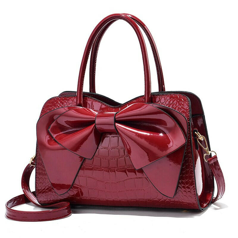Elegant shoulder bag crafted from premium leather, perfect for formal events and sophisticated style.