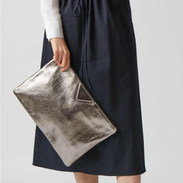 Elegant silver handbags featured in a stylish design, perfect for enhancing your formal attire and special occasions.
