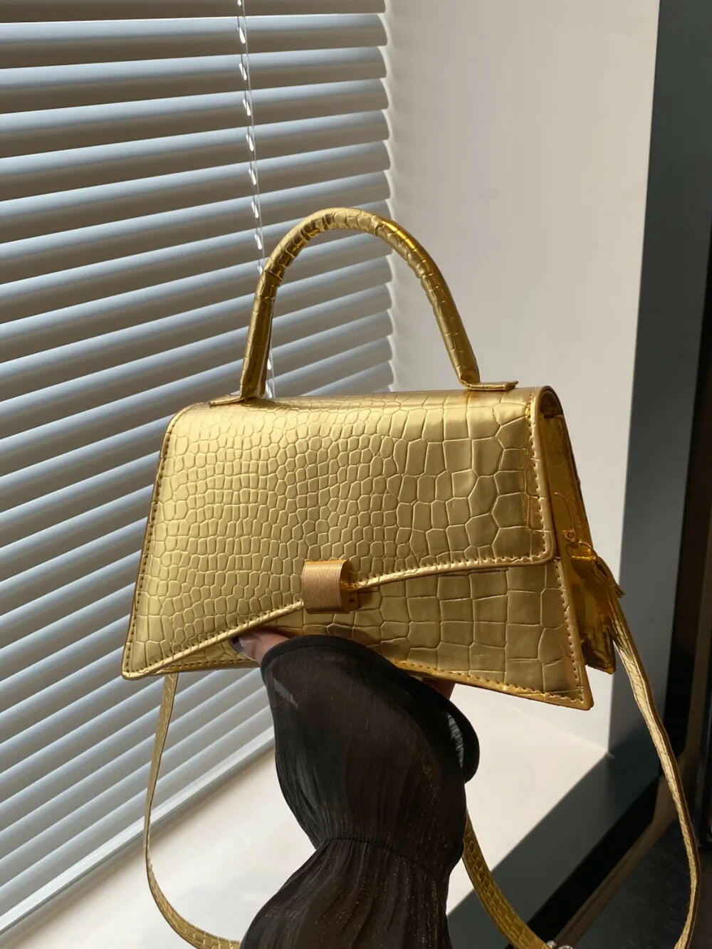 Elegant leather handbags and body shapers designed to enhance style and comfort for everyday use