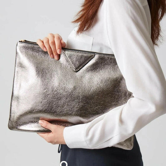 Elegant silver handbags featured in a stylish design, perfect for enhancing your formal attire and special occasions.