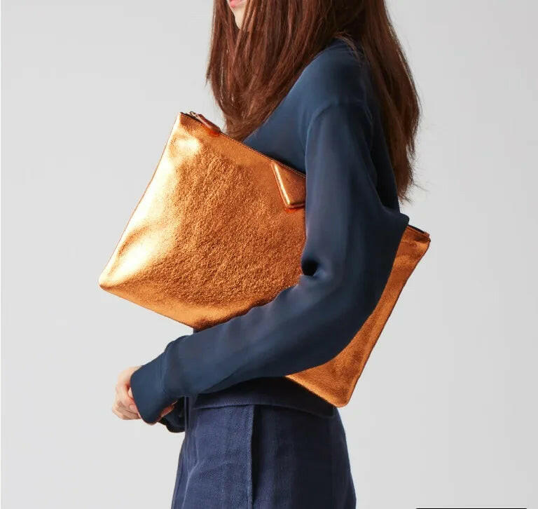 Elegant silver handbags featured in a stylish design, perfect for enhancing your formal attire and special occasions.