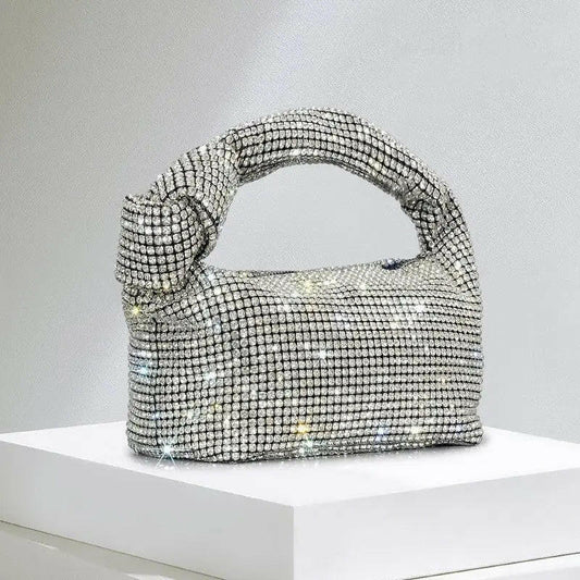 Elegant silver Handbags showcasing luxury and style, perfect for modern fashion enthusiasts seeking sophistication.