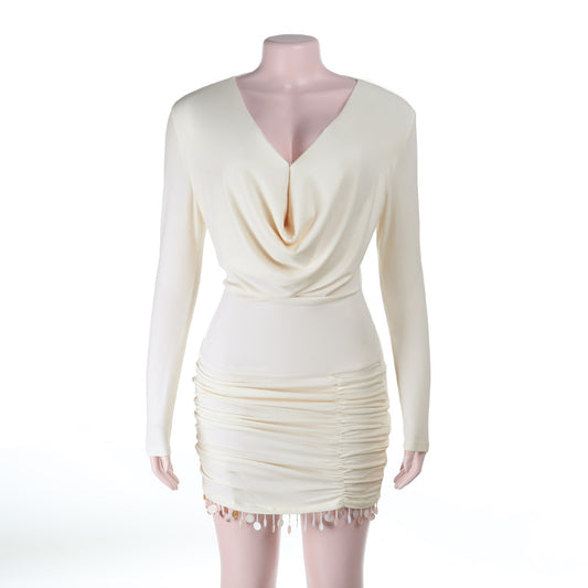 Sexy tassel long sleeved hip hugging skirt