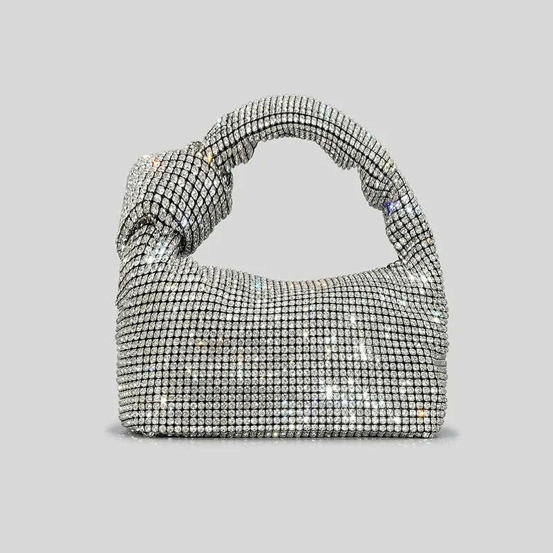 Elegant silver Handbags showcasing luxury and style, perfect for modern fashion enthusiasts seeking sophistication.