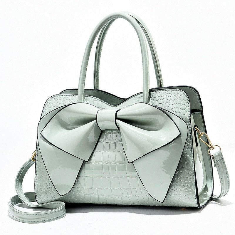 Elegant shoulder bag crafted from premium leather, perfect for formal events and sophisticated style.