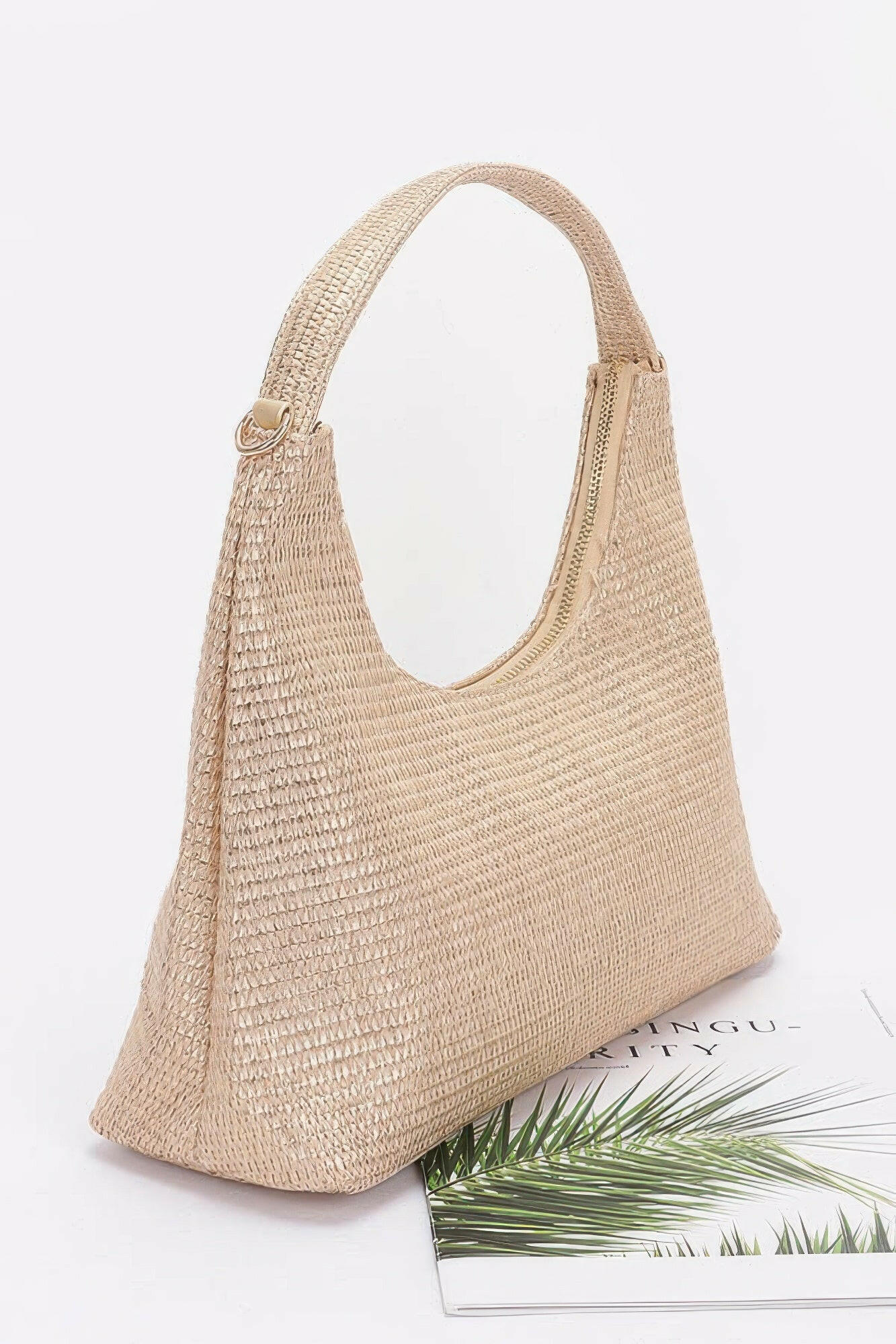 Elegant brown leather hobo bag with adjustable strap, perfect for stylish everyday use and versatile fashion statements.