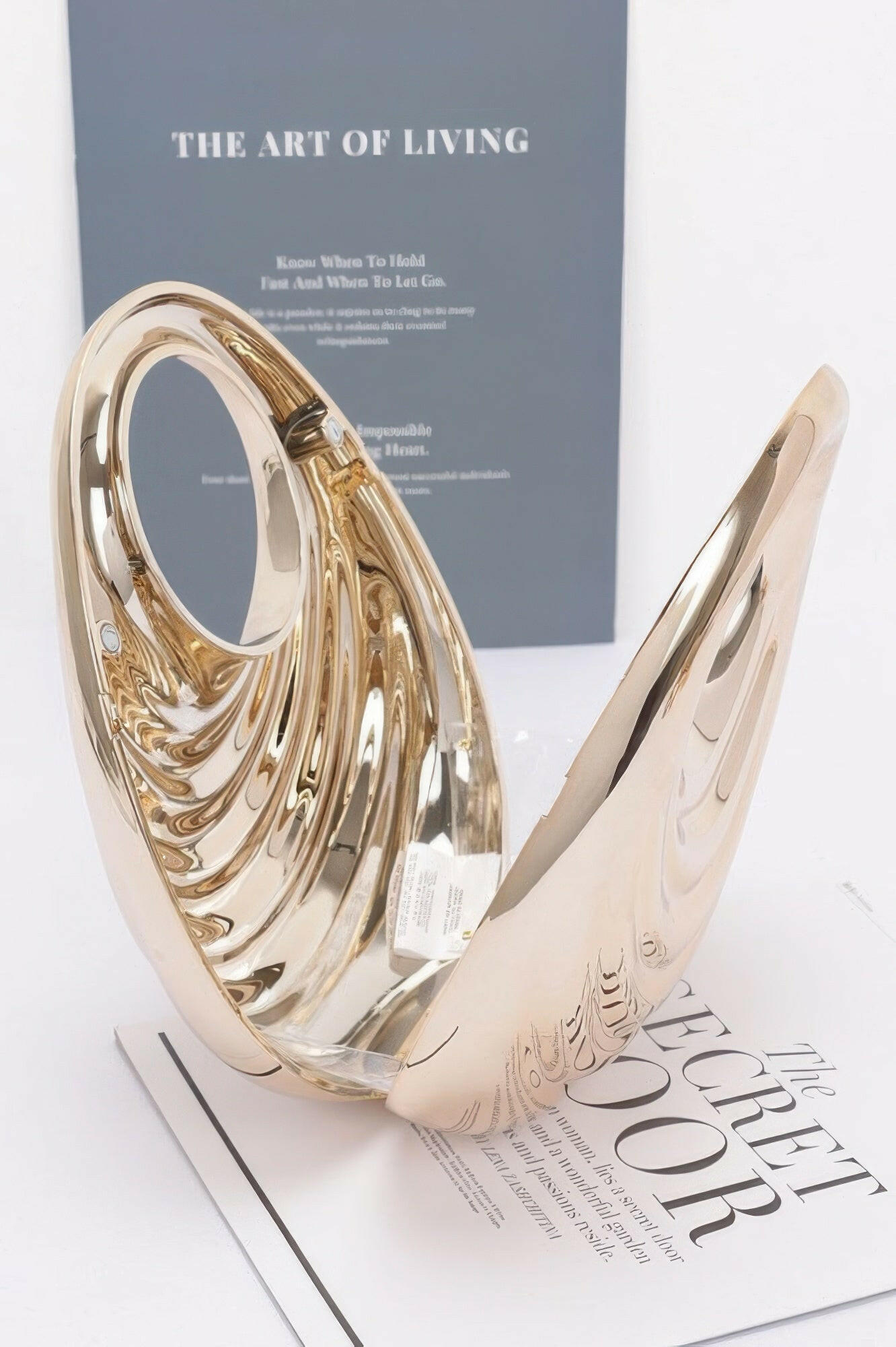 Shiny metallic acrylic bag showcasing modern design, ideal for fashion-forward individuals seeking elegant accessories.
