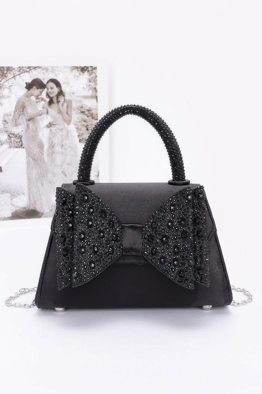 Elegant satin flap bag with refined design, perfect for formal occasions and stylish evening wear.